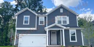 Sign and execute a lease on or before September 1, 2026, and receive a $2,400 leasing incentive! Gorgeous 4 Bedroom, 3 Bath Home with a 2-Car Garage & Guest Suite on the Main Level in Harpers Landing, Garner – Available Sept 1st! Gallery 1