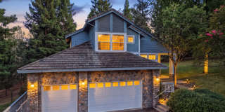 4-Bedroom Home with Wraparound Deck, 3-Car Garage & Private Setting! Gallery 1