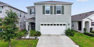 Available Now! 4BR Home in Avalon Park with Fenced Yard & Resort-Style Amenities Gallery 1