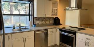 Beautiful One-Level Home with Sunroom, Vaulted Ceilings & Multiple Living Areas Gallery 9