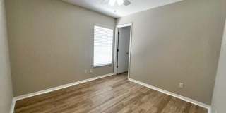 Welcome Home! Updated flooring & fresh interior paint! Move in OCTOBER! Beautiful 3X2 with attached 2 car garage! Lawn care included! Near E50!! Gallery 45