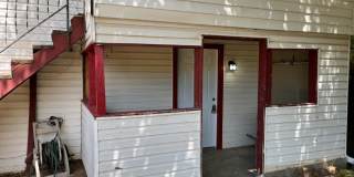 1 bed downstairs unit with courtyard, laundry access,brand new appliances, paint and flooring, includes all utilities up to 200 monthly Gallery 9
