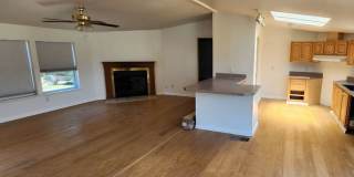 Charming 3 Bedroom + Den Home with Open Floor Plan, pet friendly,  garden area. Gallery 1