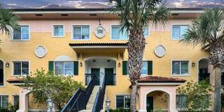 Gated 2 Bed/ 2.5 Bath Condo with 24/7 Security  Monitoring! Screened in Lanai with Water Views! Gallery 1