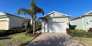 55+ community in Four Seasons of Orlando 2 bedroom, 2 bathroom, with a 2 stall attached garage on a golf course Gallery 1