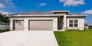 Brand-New 4-Bedroom Home with 3-Car Garage  Fenced Yard in Cape Coral! Gallery 1