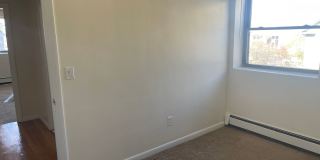 No Fee Massive 2 bed with New floors, kitchen and paint, AC VERY SUNNY!!  PARKING INCLUDED Gallery 7