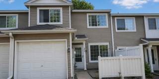 Spacious 2-Bedroom Woodbury Townhome with Walk-In Closets, Pond Views & Attached Garage! Gallery 1