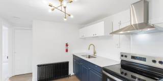 Renovated 3-Bedroom Apartment with Bonus Finished Attic & Spacious Shared Backyard Gallery 1