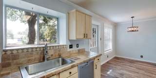 Modern Elegance: 3-Bedroom Townhome with Wood Flooring, Shaded Deck, and Inclusive Amenities Gallery 11