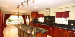 Large 4 bedroom, 3 bath, 4+ parking, gated single family house in Kalihi Gallery 1