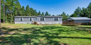 Spacious 5-Bedroom Home with Huge Fenced Yard in Milton! Gallery 1