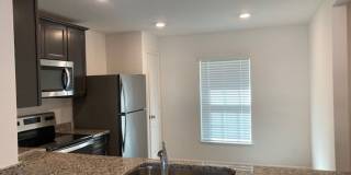 Like New 3/2/2 house with a screened in porch. Gallery 5
