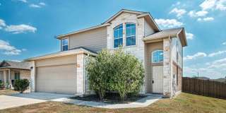 Beautiful 4/2.5/2 two story with office on oversized corner lot! Gallery 1