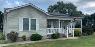 Quiet country setting, yet close to area beaches, local schools and shopping. Gallery 1