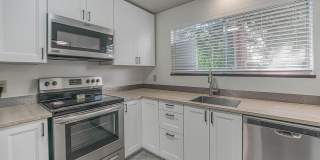 NW Vancouver Condo with Detached Garage & Dedicated Parking Gallery 5