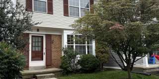 Spacious 3-Bedroom Townhome in Wellington Valley | Finished Basement & Wooded Views Gallery 1