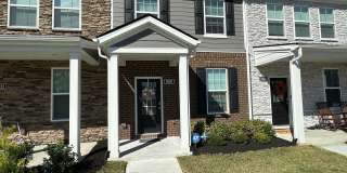 FOR LEASE- Townhome Nestled on a quiet dead-end road, perfect for those seeking privacy and peaceful surroundings. Gallery 1
