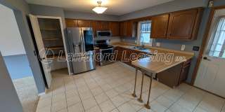 Spacious Elyria Split-Level Near LCCC with Fireplace & Fenced Yard Gallery 7