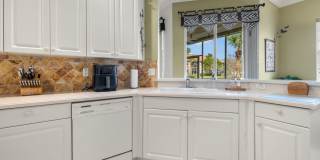 Experience Bell Tower Park. GATED ground floor 2 Bed 2 Bath Den 1 Car Garage Condo. Gallery 6