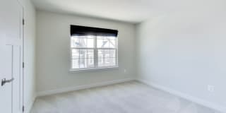 Welcome to this beautifully designed 3 level townhome in Westphalia Town Center Community! Gallery 21