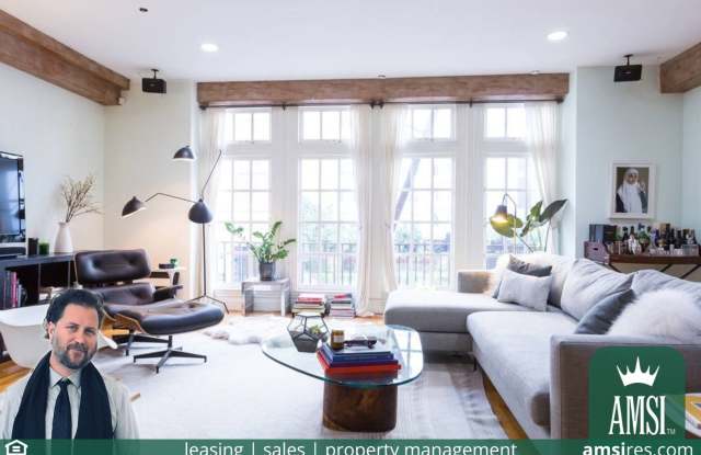 Amazing SOHO style full level designer Parkhouse in boutique 3 unit building, featuring an expansive living space, gourmet kitchen, two patios and pets welcome! photos photos