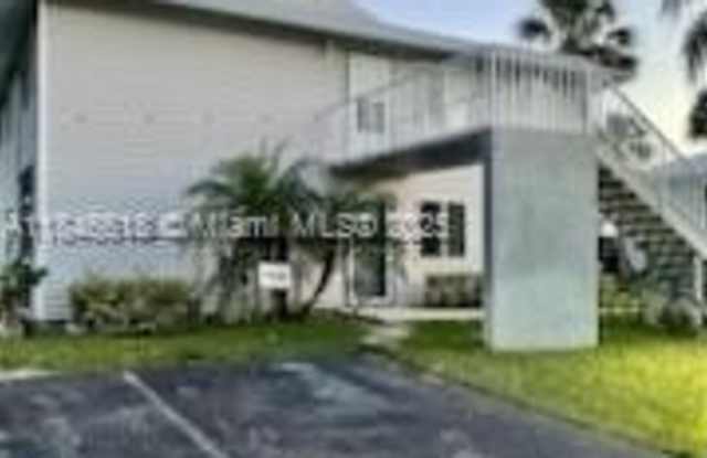 150 SE Village Dr photos photos