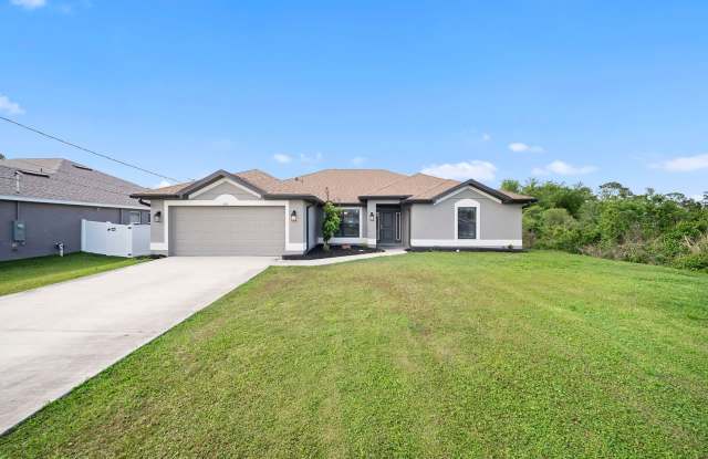 Stunning 4-bedroom, 3-bathroom gem, built in 2023 in Lehigh Acres Gallery 1