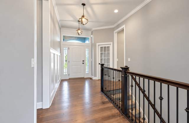 Stunning South Overland Park Home near Bluehawk! 4 Bedroom, 3 Bathroom Overland Park Home with Treed Backyard, 3-Car Garage & Resort-Style Community Amenities Gallery 3