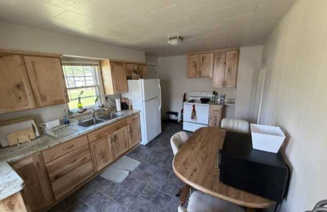 3 bedroom, 1 bath. Large yard with large storage shed. Gallery 4