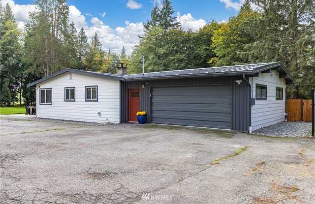 $1000 Rent Credit with 12 Month Lease! Spacious 3-bedroom 3 baths with Over an Acre of Land with a Private Gate! photos photos