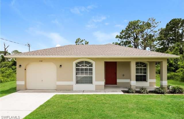 718 Sunrise Boulevard - 718 Sunrise Boulevard, Lehigh Acres, FL 33974