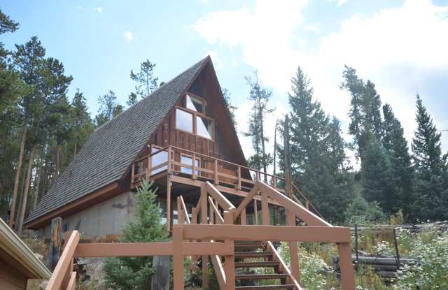 Garden level one bedroom apartment in the hills above BRECK.  Pets OK!  Includes HEAT and electric!  One Car Space in the Garage! Gallery 4
