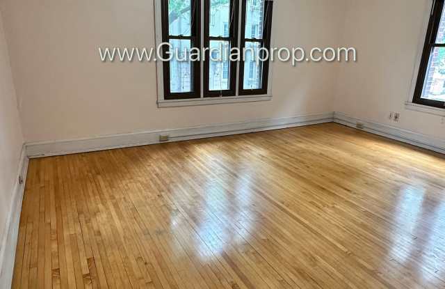 Front Facing 2nd floor Lakes Uptown Apartment, Blocks from Both Lakes, Hardwood Floors, One Month Free photos photos