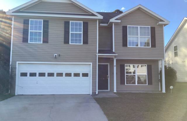 Outstanding Four Bedroom Home Approximately Ten Minutes Away from Ft. Jackson! photos photos