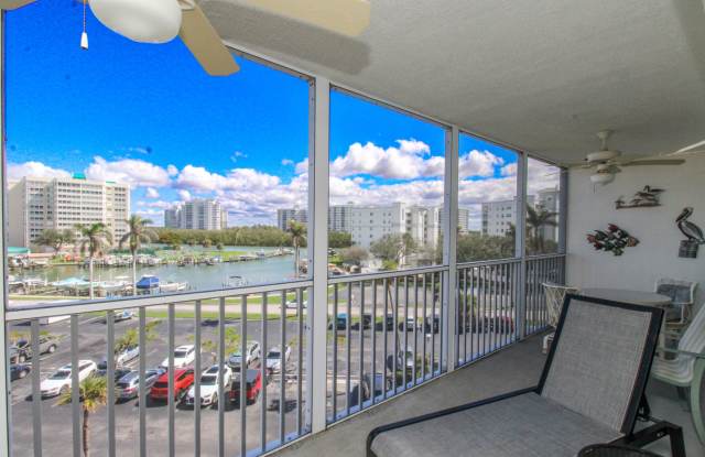 ** OFF-SEASONAL OR 6 MONTHS AND 1 DAY ANNUAL 1 BEDROOM\1 BATH CONDO AVAILABLE MAY-DECEMBER 2026 ** VANDERBILT TOWERS ** LARGEST 25 FOOT LANAI WITH STRAIGHT VIEW OF THE MARINA AND GULF OF MEXICO VIEWS ** photos photos