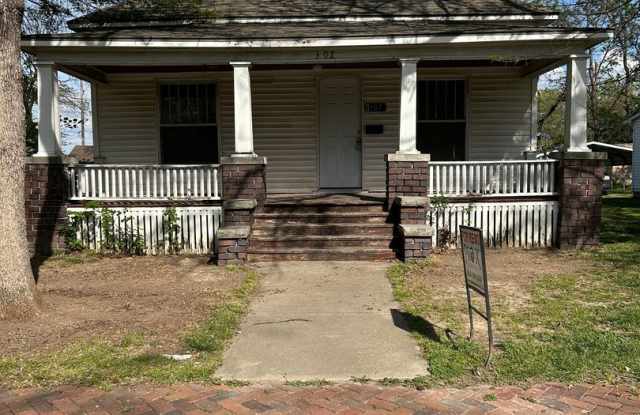 COMING SOON!!  Brand new hardwood floors!!  New Pictures Coming Soon!  Nice 2 bedroom 1 bath house comes with nice shed and carport.  Pet friendly! photos photos