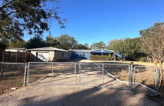 Rare find: a well-maintained, single-story, 4 bedrooms, 2.5 baths home on a large private lot in Central Cedar Park! Gallery 1