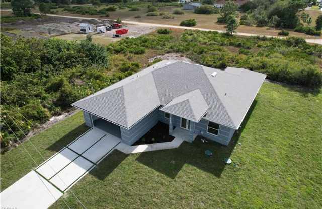 852 Chipley Street East - 852 Chipley Street East, Lehigh Acres, FL 33974