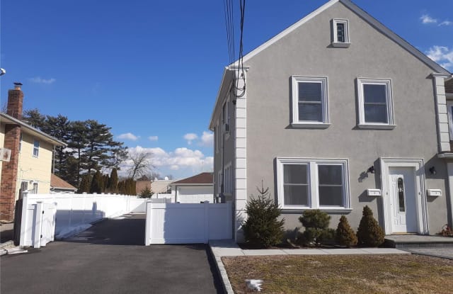 32 Longfellow Avenue - 32 Longfellow Avenue, New Cassel, NY 11590 32 Longfellow Avenue - 32 Longfellow Avenue, New Cassel, NY 11590