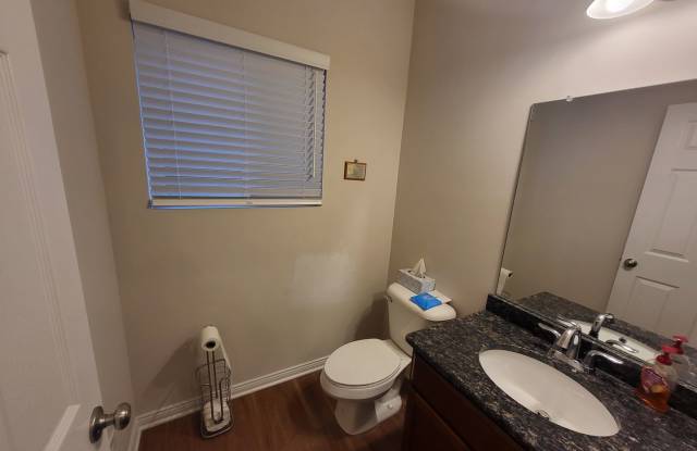 Spacious 4-Bedroom, 2.5-Bath Home Near Downtown Holly photos photos