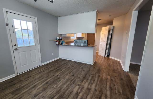 Cozy 3 Bedroom Home with Spacious Kitchen and Private Backyard Gallery 3