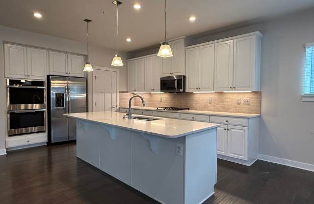 Stunning Greenleigh Home with 4 Bedrooms, 4.5 Baths & Designer Kitchen Gallery 4