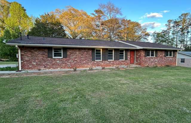 JUST LIKE NEW!  Landlord just finishing up doing a total remodel on this 3 bedroom/2 bath home with large outbuilding. Gallery 1