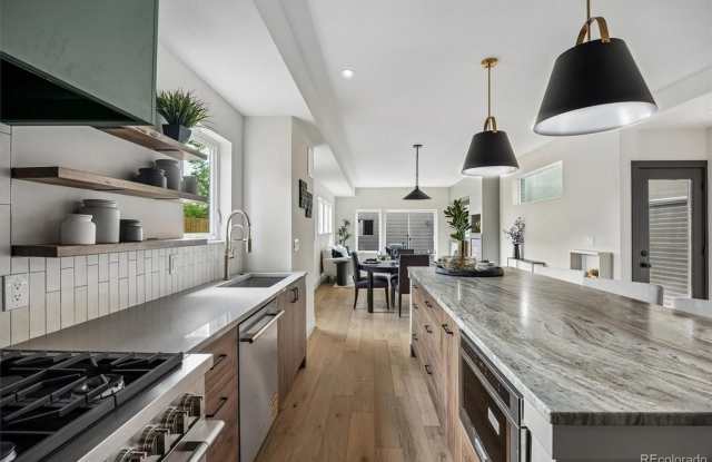 Brand-New Modern 4BR Home with Rooftop Deck & Mountain Views in Overland Gallery 4