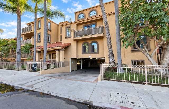 Spacious Top-Floor 3-Bedroom Corner Condo with 2 Parking Spaces Gallery 3