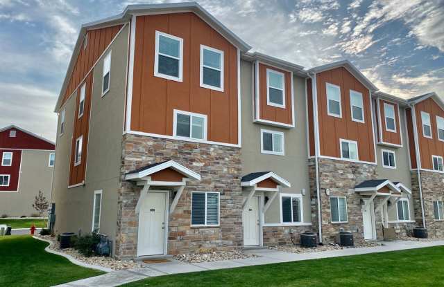 Gorgeous 3-Story Townhomes in Payton's Quarry in Herriman. In Unit Washer/Dryer and Other Premier Onsite Amenities! photos photos