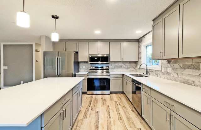 Sparkling Spacious New Home, Dream Kitchen, Fireplace, Large Deck, Family Room, Perfect Location, 196 Schools! Gallery 4