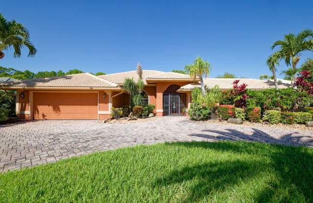 Tranquil Lakefront Living in the Heart of Port St. Lucie with Pool! photos photos
