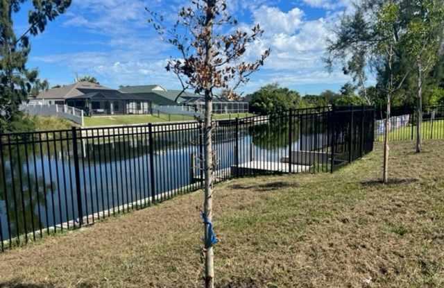 Brand-New Canal Front Home with Private Dock, 3-Car Garage & Modern Upgrades in Cape Coral Gallery 4